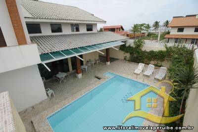 Sobrado com piscina, com 6 dormitórios (  3 suíte) a  90 metros da praia.