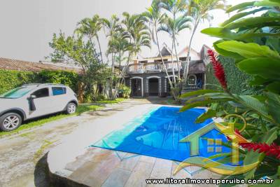 Sobrado com piscina, com 8 dormitórios (  6 suíte) a frente ao mar.